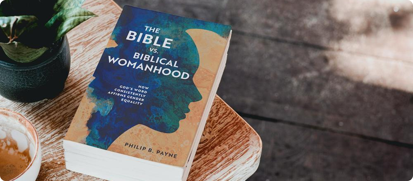 Book 'The Bible vs. Biblical Womanhood' by Philip B. Payne on table